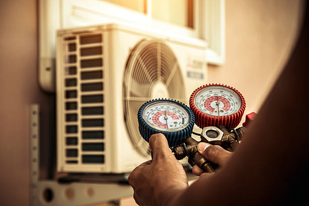 Professional Air Conditioning Service technician working in Brooklyn, CT